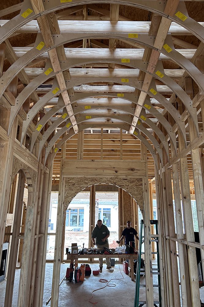 The arches create a sense of grandeur and flow throughout the interior.