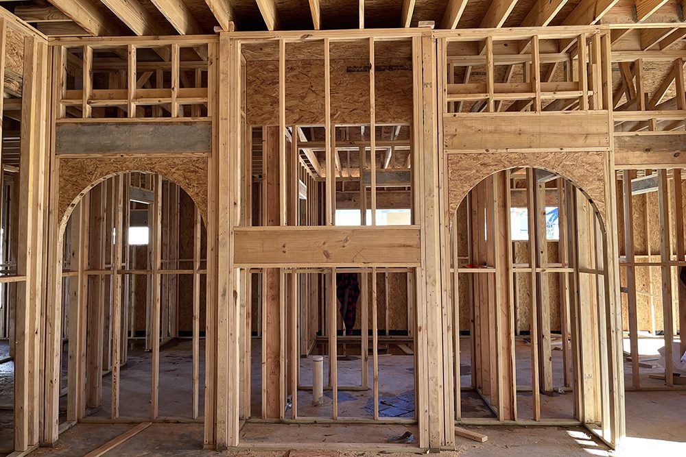 These arches will later define elegant transitions between living spaces.